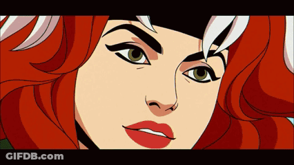 A Close Up Of A Cartoon Character With Red Hair And Green Eyes GIF