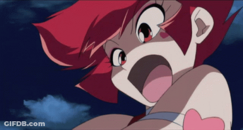 A Close Up Of A Cartoon Character With Red Hair GIF