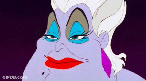 A Close Up Of A Cartoon Character With Red Lips And Blue Eyeshadow GIF