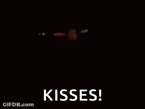 A Close Up Of A Cartoon Character With The Words Kisses On It GIF