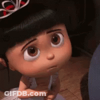 A Close Up Of A Cartoon Doll Wearing A Tiara And A White Dress . GIF