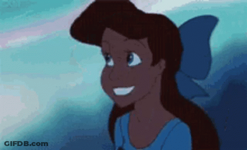 A Close Up Of A Cartoon Girl With A Blue Bow On Her Head . GIF