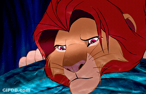 A Close Up Of A Cartoon Lion With Red Hair And Pink Eyes GIF