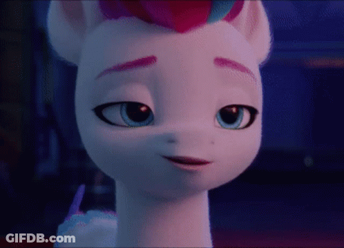 A Close Up Of A Cartoon Pony 'S Face With Blue Eyes GIF