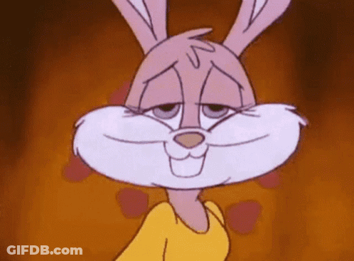 A Close Up Of A Cartoon Rabbit Wearing A Yellow Shirt . GIF