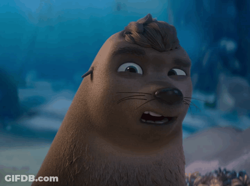 A Close Up Of A Cartoon Seal With A Wig On Its Head GIF