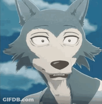 A Close Up Of A Cartoon Wolf With A Surprised Look On His Face . GIF