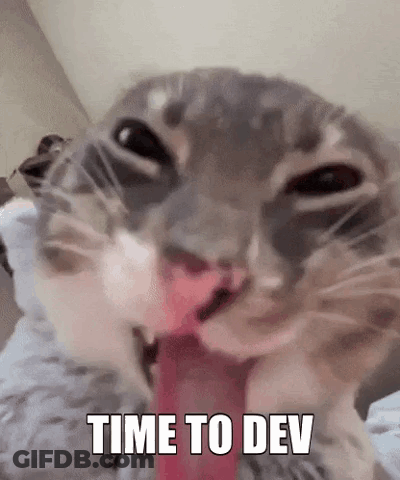 A Close Up Of A Cat Licking Its Nose With The Words `` Time To Dev '' Written On It . GIF