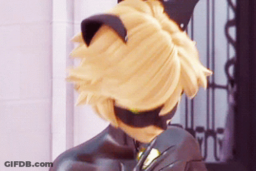 A Close Up Of A Cat Noir From Miraculous Ladybug Wearing A Cat Mask . GIF