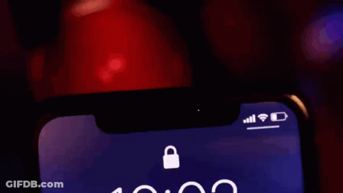 A Close Up Of A Cell Phone Displaying The Time As 10:02 GIF