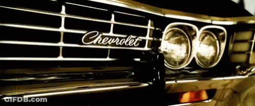 A Close Up Of A Chevrolet Car 'S Grill GIF