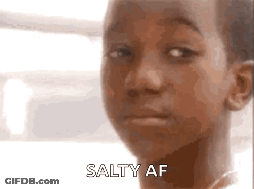 A Close Up Of A Child 'S Face With The Words Salty Af Written On The Bottom GIF