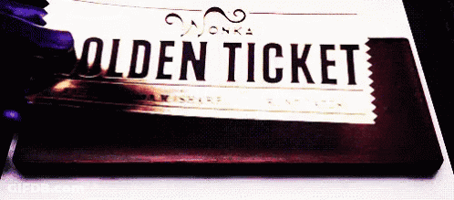 A Close Up Of A Chocolate Bar That Says Golden Ticket On It GIF