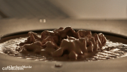 A Close Up Of A Clayface Movie Advertisement GIF