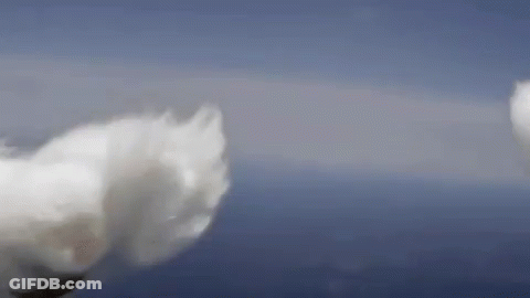 A Close Up Of A Cloud In The Sky With A Blue Sky In The Background . GIF