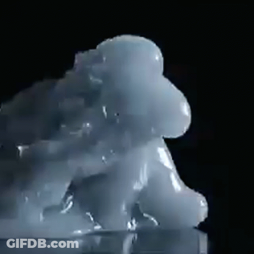 A Close Up Of A Cloud Of Liquid On A Black Background GIF