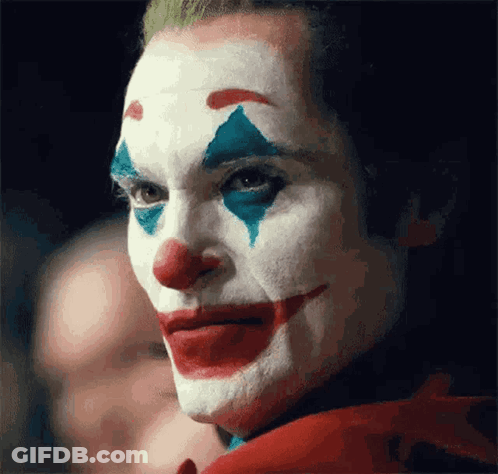 Clown Face With Red White And Blue Makeup GIF