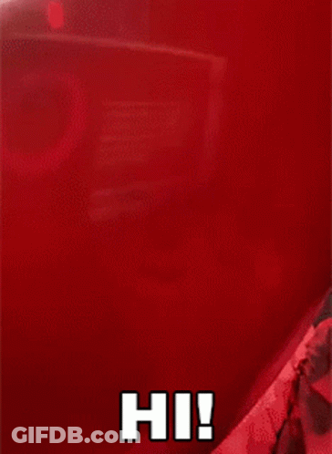 A Close Up Of A Clown With A Red Balloon And The Words Hi ! GIF