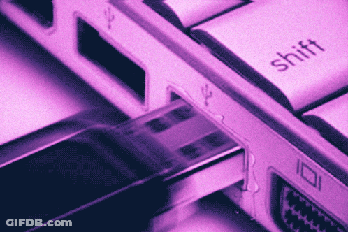 A Close Up Of A Computer Keyboard With The Shift Key Visible GIF