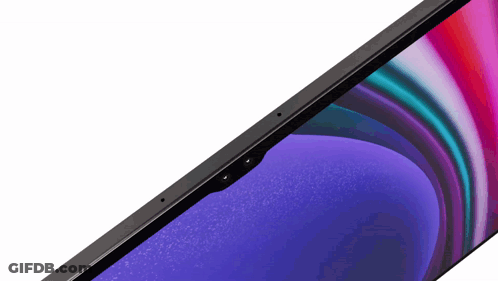 A Close Up Of A Computer Screen With A Purple Swirl GIF