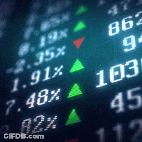 A Close Up Of A Computer Screen With Numbers And A Green Arrow Pointing Up GIF