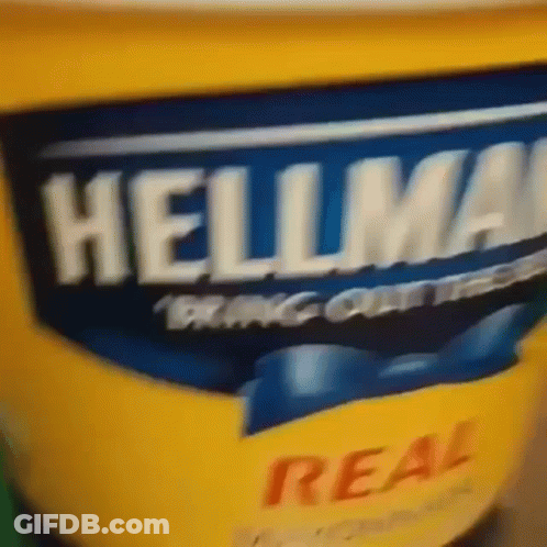 A Close Up Of A Container Of Hellmans Mayonnaise GIF