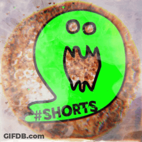 A Close Up Of A Cookie That Says Shorts GIF