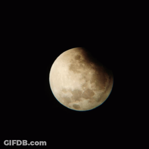 A Close Up Of A Crescent Moon In The Night Sky GIF