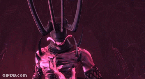 A Close Up Of A Demon 'S Hand With Sharp Teeth GIF