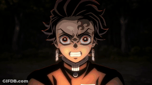 A Close Up Of A Demon Slayer Character With A Fire Coming Out Of His Mouth GIF