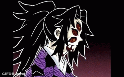 A Close Up Of A Demon Slayer Character With Red Eyes . GIF
