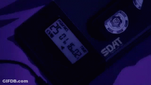 A Close Up Of A Device With A Purple Background And A Purple Screen . GIF
