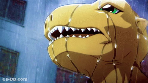 A Close Up Of A Dinosaur 'S Face With Water Dripping From Its Mouth GIF