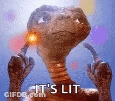 A Close Up Of A Dinosaur With A Light Coming Out Of It 'S Ear . GIF