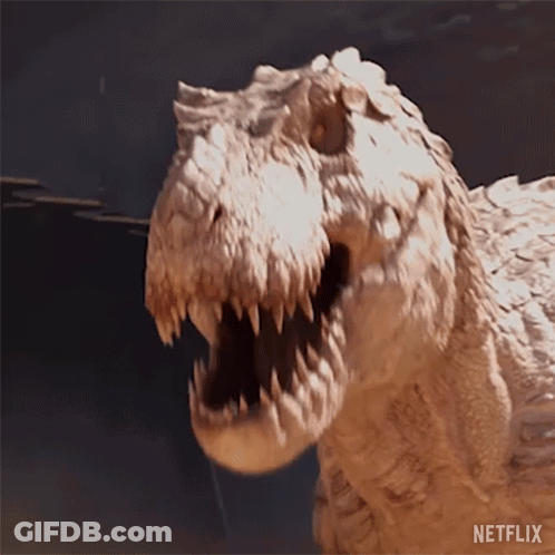 A Close Up Of A Dinosaur With Its Mouth Open And The Word Netflix On The Bottom Right GIF