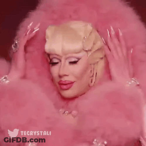 Close Up Of Drag Queen's Face With Twitter Icon GIF