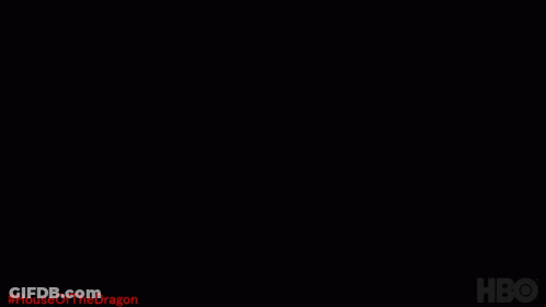 A Close Up Of A Dragon 'S Face With The Hashtag #House Of The Dragon GIF