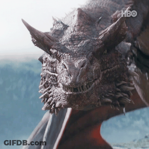 A Close Up Of A Dragon 'S Face With The Hbo Logo Visible GIF
