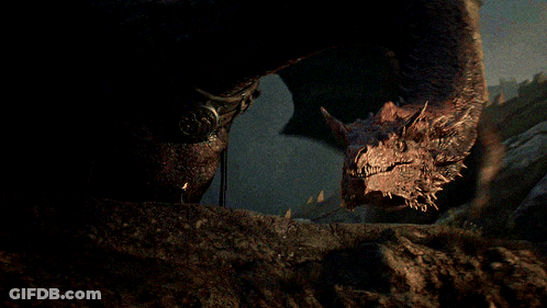 A Close Up Of A Dragon 'S Head And Neck GIF