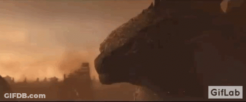 A Close Up Of A Dragon 'S Head In A Video Game . GIF