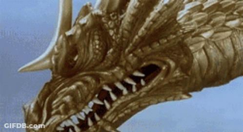 A Close Up Of A Dragon 'S Head With A Blue Sky In The Background GIF