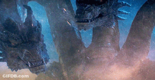 A Close Up Of A Dragon 'S Head With A Lot Of Sharp Teeth GIF