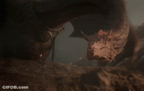 A Close Up Of A Dragon 'S Head With A Very Long Neck GIF