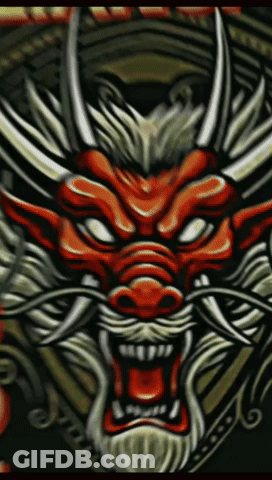A Close Up Of A Dragon 'S Head With Horns And A Beard GIF
