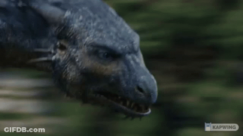 A Close Up Of A Dragon 'S Mouth With The Word Kapwing On The Bottom GIF