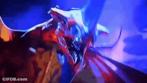A Close Up Of A Dragon With A Blue Background GIF
