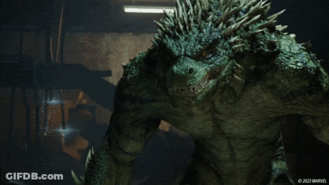 A Close Up Of A Dragon With A Marvel Logo On The Bottom Right GIF