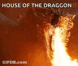 A Close Up Of A Dragon With Fire Coming Out Of Its Mouth . GIF