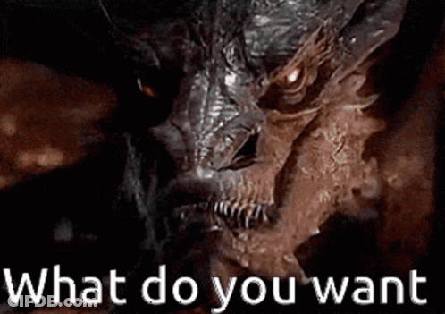 A Close Up Of A Dragon With The Words What Do You Want Written Below It . GIF