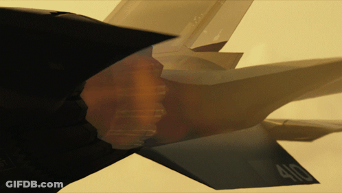 A Close Up Of A Fighter Jet With The Number 400 On The Tail GIF